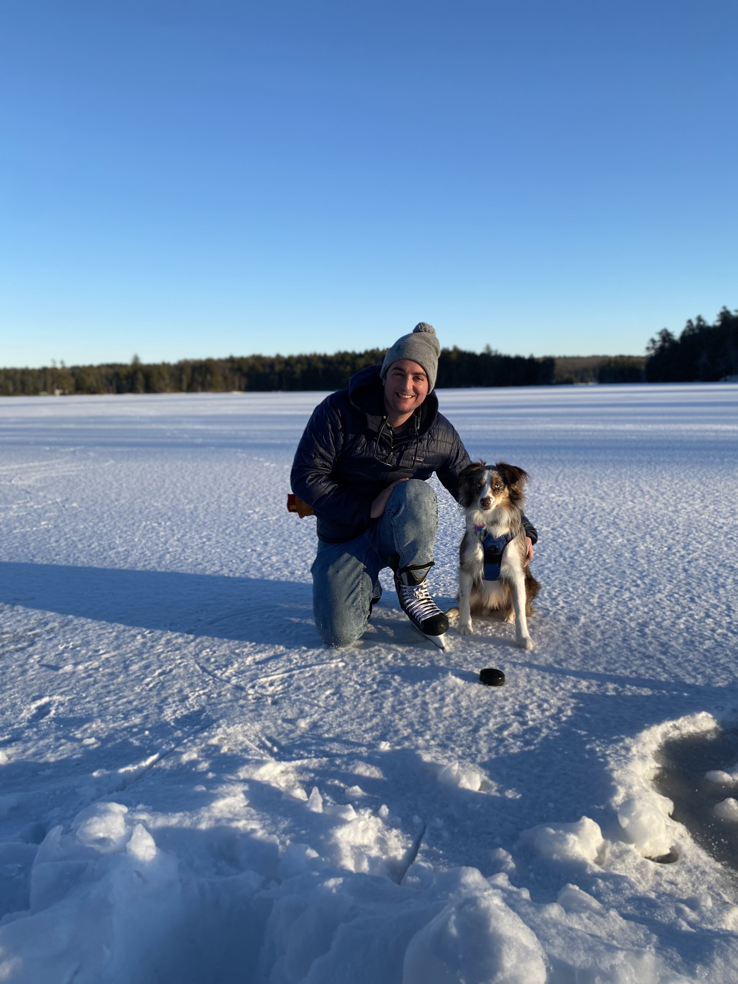 Sam Freccia and dog in snow